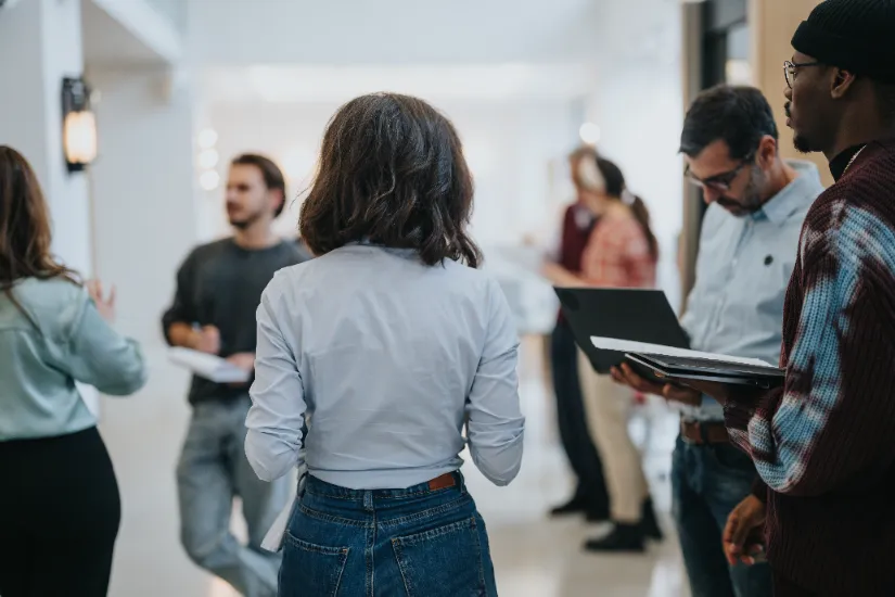 a group of professionals gathering at an event