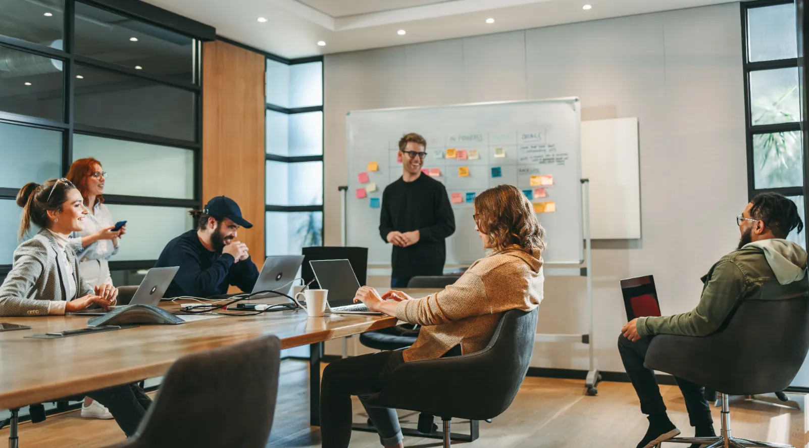 a group of designers work on a project in the office